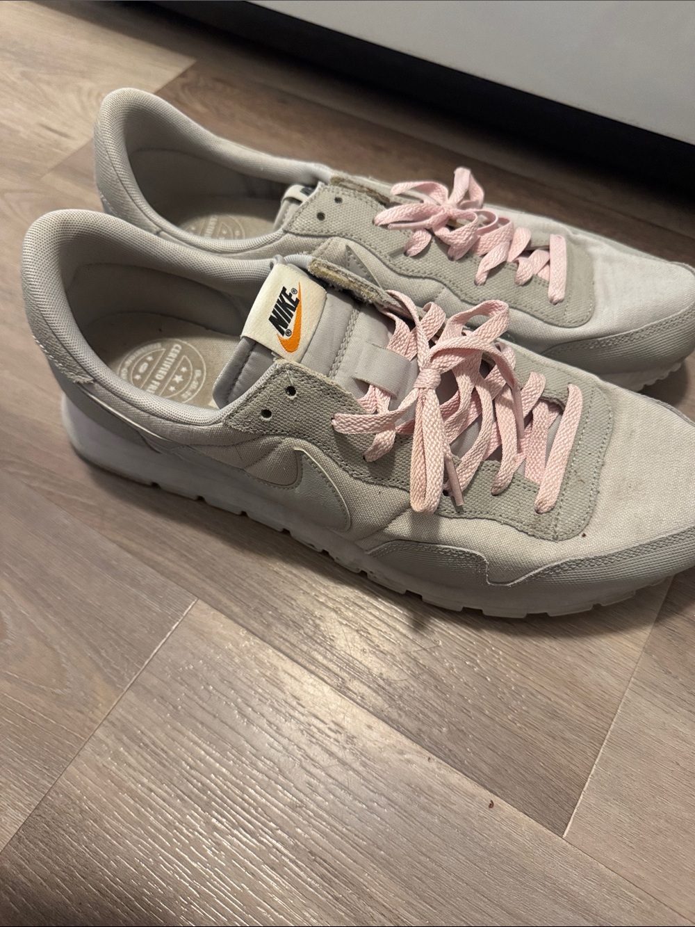 Nike Women's Beige Trainers with Pink Laces